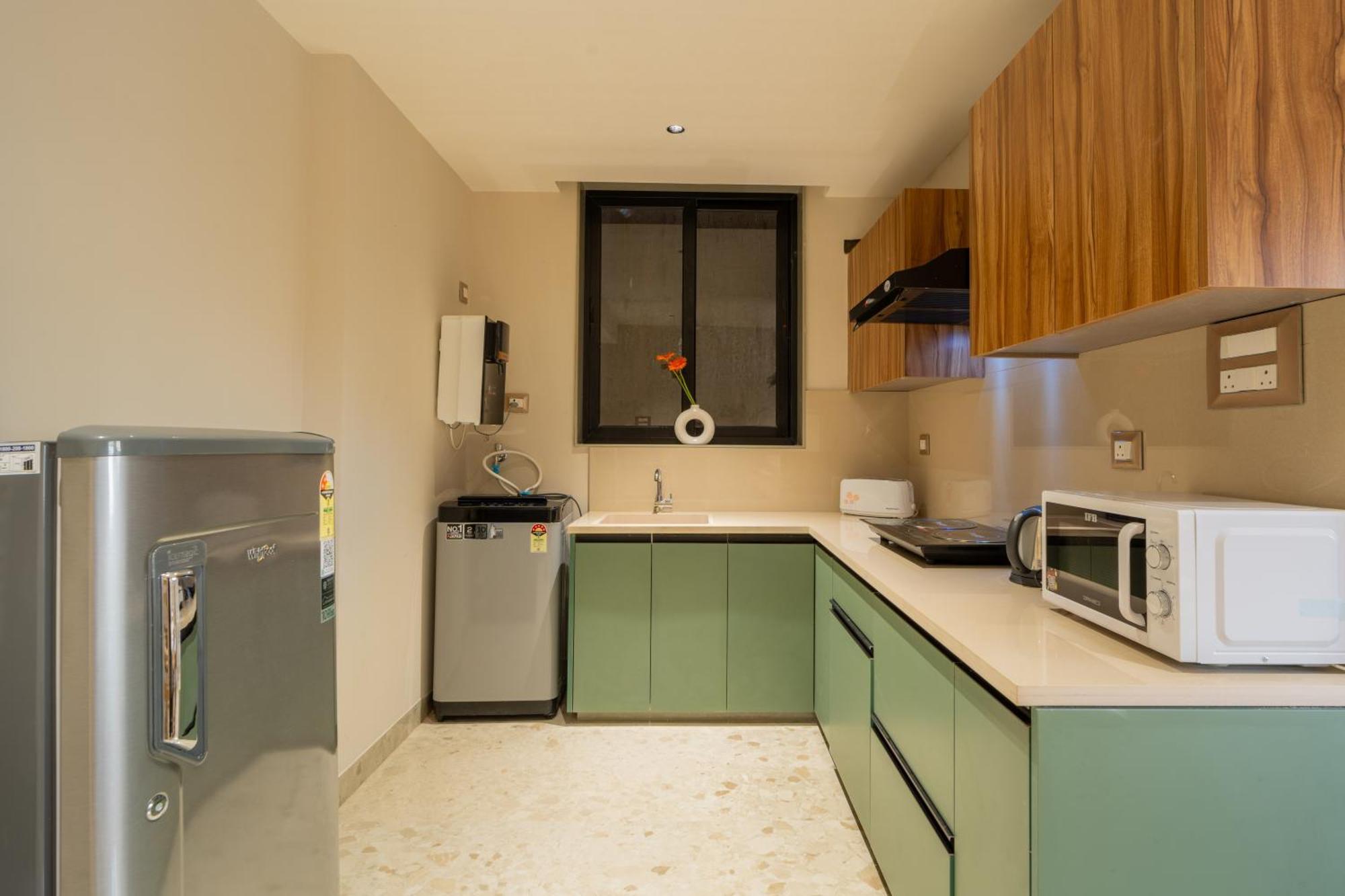 Elivaas 1 Bhk With Rooftop Pool - Kamerios Verano Apartment