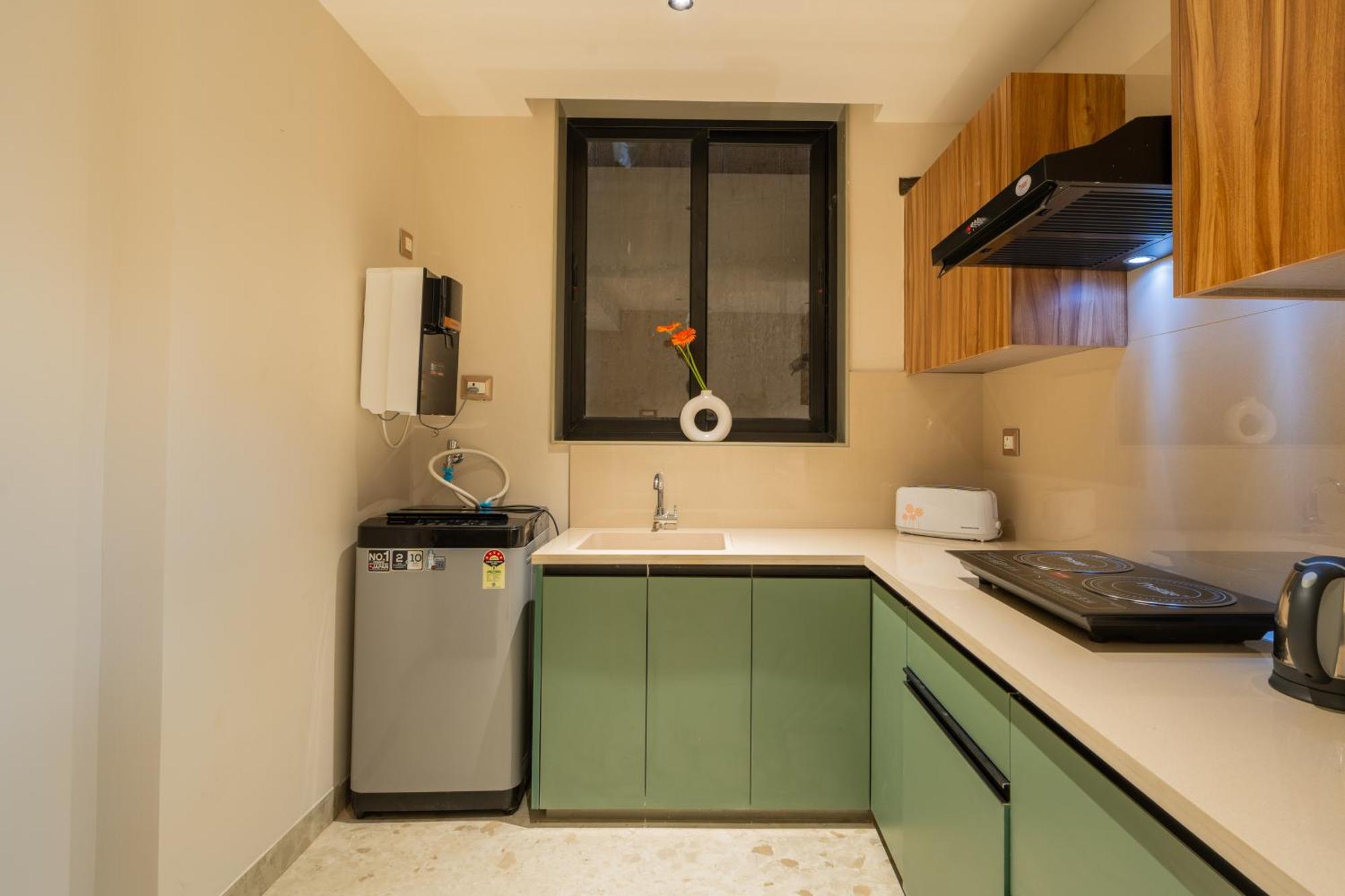 Elivaas 1 Bhk With Rooftop Pool - Kamerios Verano Apartment