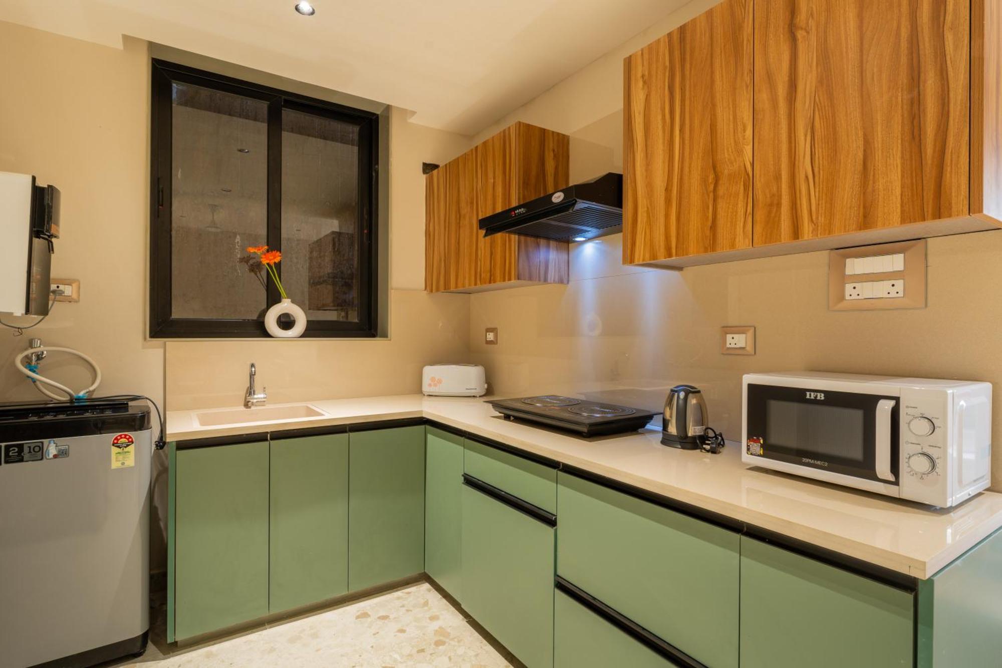 Elivaas 1 Bhk With Rooftop Pool - Kamerios Verano Apartment